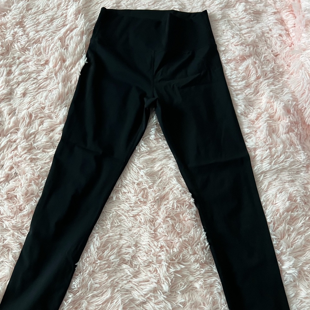2 pair of ZYIA leggings- one light n tight, one brilliant. Both size 8-10.